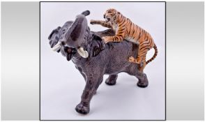 Beswick Figure Tiger Attacking An Elephant. Model number 1720. Issued 1960-1975. Height 12 inches.
