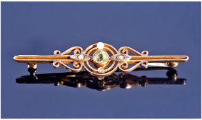 Edwardian 9ct Gold Set Peridot And Seed Pearl Circular Openwork And Scroll Work Brooch. 3.1 grams.