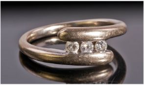 18ct Gold Diamond Ring Set With Three Round Cut Diamonds On A Twist, Stamped 18ct Plat, Ring Size