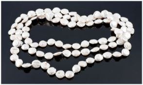 White Freshwater Baroque Coin Pearl Rope Necklace, exceptionally high lustre disc-like pearls, one