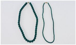 Two Carved Jade/Hardstone style necklaces`s.