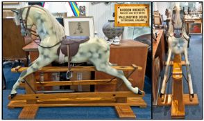 A Large Rocking Horse made by Haddon Rockers of Walking Ford. The dapple grey horse with a leather