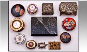 Assortment Of Lidded Trinket Boxes. Comprises two silver plated caskets, a marble lidded box, three