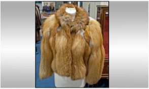 Red Fox Jacket with fox tail collar and red fox matching hat.