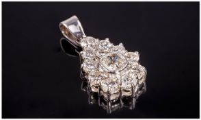 A 18ct White Gold and Platinum set Handmade Pear Shaped Diamond Pendant of fine quality. The