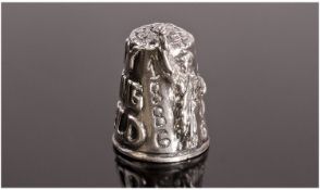 An American Silver Thimble featuring an image of the Statue of Liberty and The Legend `Liberty