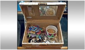Brocade Covered Jewellery Box Containing A Small Amount Of Costume Jewellery.