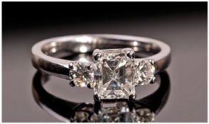 18ct White GOld Set Emerald Cut Single Stone Diamond Ring, with two round brilliant cut diamonds to