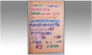 Green New Age Spring Back Album, with stock cards housing thousands of all world stamps. Many GB