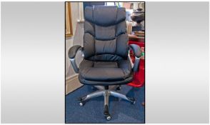 Office Chair, Upholstered in leather with silvered metal frame.