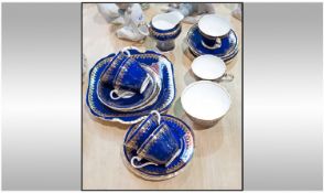 Aynsley 21 Piece Part Teaset in cobalt blue with gilded decoration. Comprising sandwich plate, 6