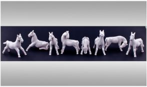 Eight Chinese Porcelain Horse Figures, each in different positions, depicting the Chinese tale of `