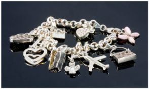 Silver Charm Bracelet Set With 10 Charms.