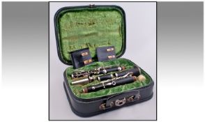 Corton Clarinet in Case, no 1792. 5 reeds and cork wax. Lock broken,