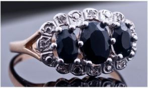 Diamond and Sapphire Cluster Ring.