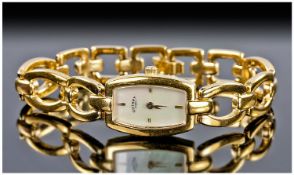 Rotary Ladies Gold Plated Wrist Watch and Bracelet. 6.75 inches in length.