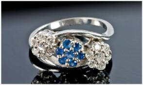 18 Carat Diamond and Sapphire Triple Cluster Ring.