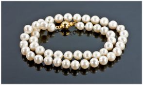 A White Cultured Akoya Pearl Necklace, 17 Inches In Length,