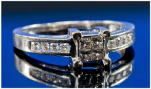 18ct White Gold Diamond Ring, Set With Four Central Princess Cut Diamonds Between Channel Set