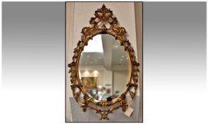 Large Rococo Style Mirror, Floral And Leaf Openwork Moulded Frame, Bevelled Glass. 45 x 27 Inches