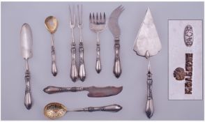 Faberge Russian Silver Comprising A Nine Piece Serving Set, All Of Solid Form With Raised Moulded