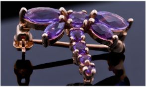 Ladies Miniature 9ct Gold and Amethyst set Bow Brooch.