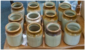 Collection of Twelve Retro Stoneware Kitchen Jars, six inches in height.