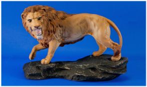 Beswick Connoisseur Wild Animal Figure `Lion On Rock`. Golden Brown. Model number 2554. Issued