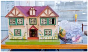 Mock Tudor Dolls House Height 16 Inches x 23 Inches Wide. Together With A Small Quantity Of Dolls