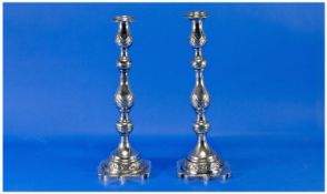 A Silver Pair of Georgian Style Candlesticks with Detachable Nozzles and Shaped Base, Hallmark