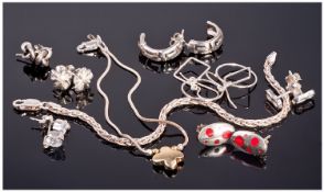 A Collection of Solid Silver Jewellery Items, comprising bracelets and earrings. 9 in total