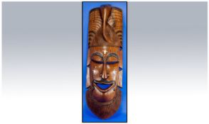Wooden African Hand Carved Wall Hanging Mask, Purchased from Sudan by vendor. 26 inches in length.