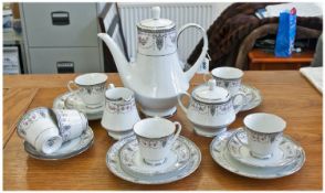 Noritake 19 Piece Part Tea Set. Comprises 6 cups and saucers, 4 medium side plates, milk jug, sugar