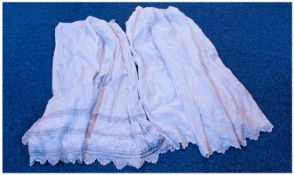 Two Embroidered White Cotton Petticoats.