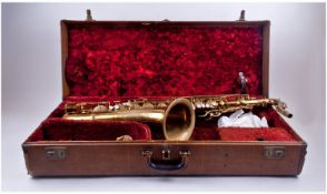 C.G. Conn Ltd Gold Coloured Tenor Saxophone. Serial number M268954 9854. Complete with original