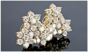 Pair of 18 Carat Diamond Cluster Earrings. Diamond weight 4 carats.