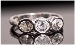 18ct White Gold Set 3 Stone Diamond Ring. The oval shaped, brilliant cut diamonds of good colour