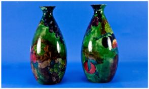 S. Hancock and Sons Signed and Hand Painted Pair of Titian - Ware Fruit Vases by F.X.Abraham. c.