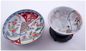 Two Japanese Imari Bowls. One with typical Imari decorations of birds and flower motifs. 8 inch