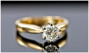 18ct Gold Set Single Stone Round Diamond Ring. The diamond of good colour. Est. 75pts. Bright and