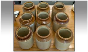 Set of Nine Retro Stoneware Kitchen Jars, 8 inches high