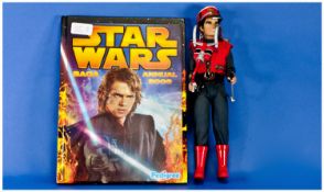 Captain Scarlet Figure, together with Star Wars 2006 annual.