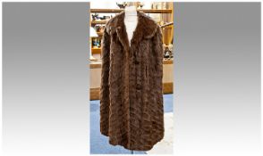 Mid Brown Russian Squirrel Three Quarter Cape, the skins placed diagonally for decorative effect,