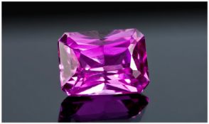An Emerald Cut Pink Sapphire approx 5ct. Excellent Colour.