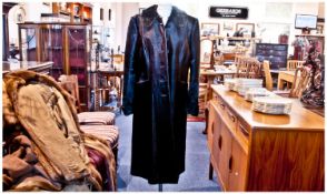Black Calf Fur and Leather Full Length Coat, stylish and well made with smooth and glossy skins,
