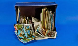 Very Large Brown Box Of Some 60 or so Souvenir Postcard Packs from around the World. Many are older