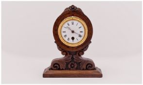 Small Carved Mantle Clock, White Enamelled Dial, Roman Numerals, Spring Driven. With Later Carved