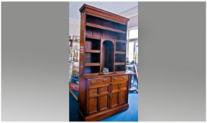 Late Victorian Walnut and Mahogany Bookcase, in the arts and craft style. With open bookcase top,