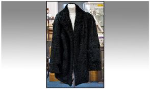 Black Astrakhan Ladies Three Quarter Length Coat, fully lined. Very good condition. Approx size 12-