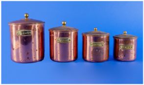 Set of Four Inter Stacking Copper Kitchen Canisters with brass `Flour`,`Coffee`. `Flour` and `Tea`